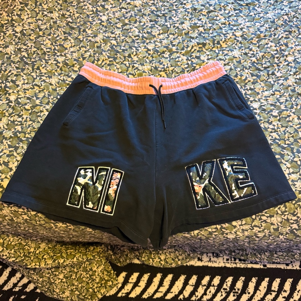Nike Women's Black Shorts with Peach Trim